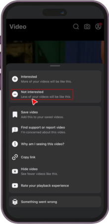 Facebook app pointing to Not Interested